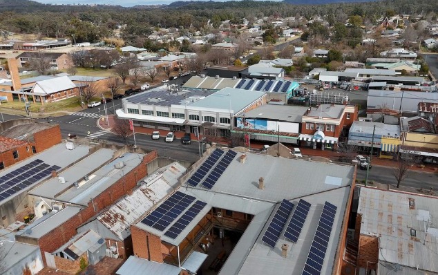Aerial view of solar panels on shop and commercial rooftops in a NSW country town