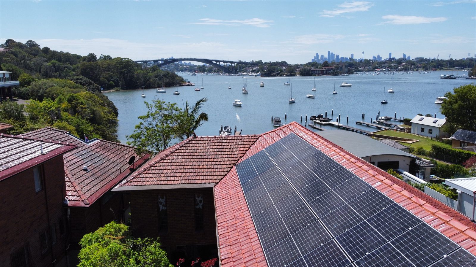 10.56kW solar system on a terracotta tile roof overlooking the harbour in Henley, NSW
