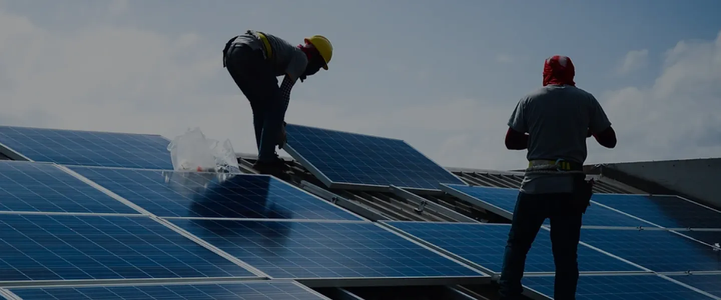 Guwing Green installers fitting solar panels