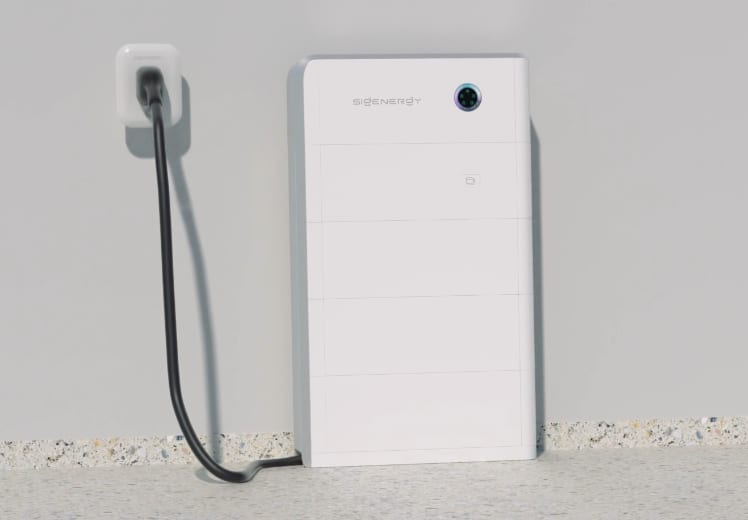 The Sigenergy Sigen EV DC Charger, a white wall unit with a charging cable